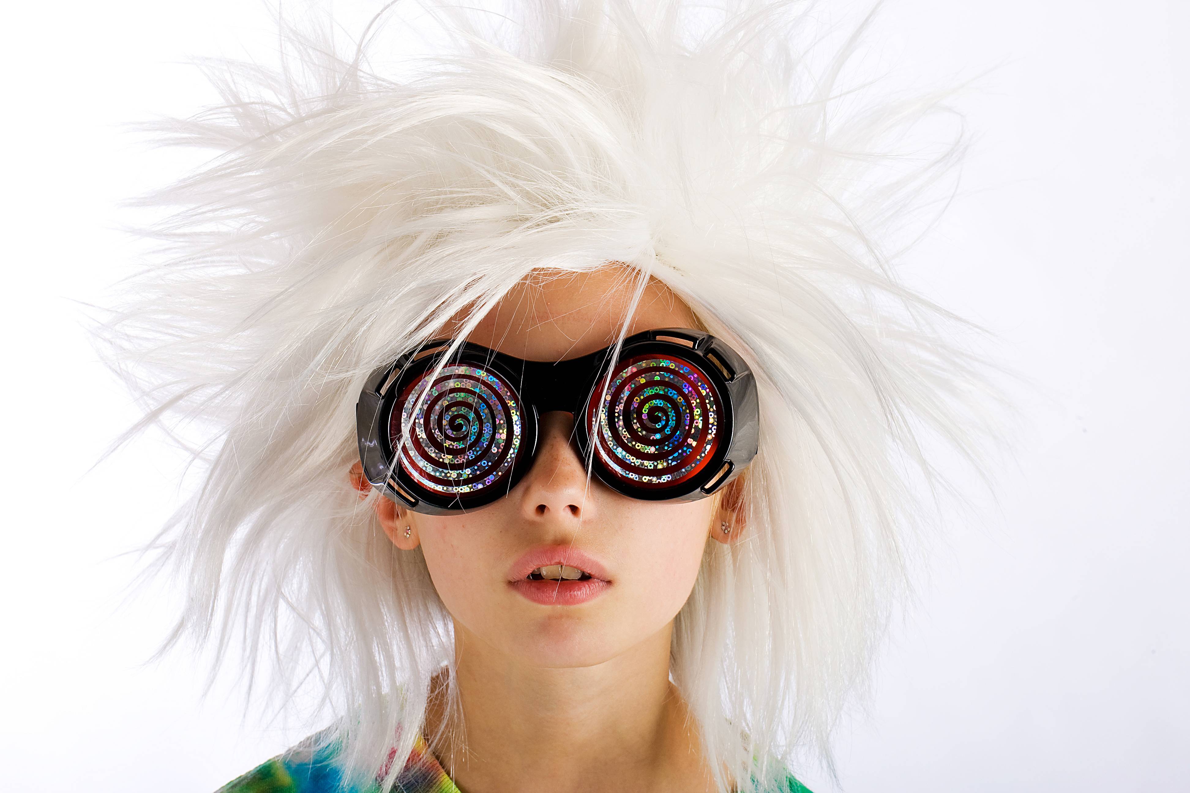 child with a funny wig and crazy eye glasses